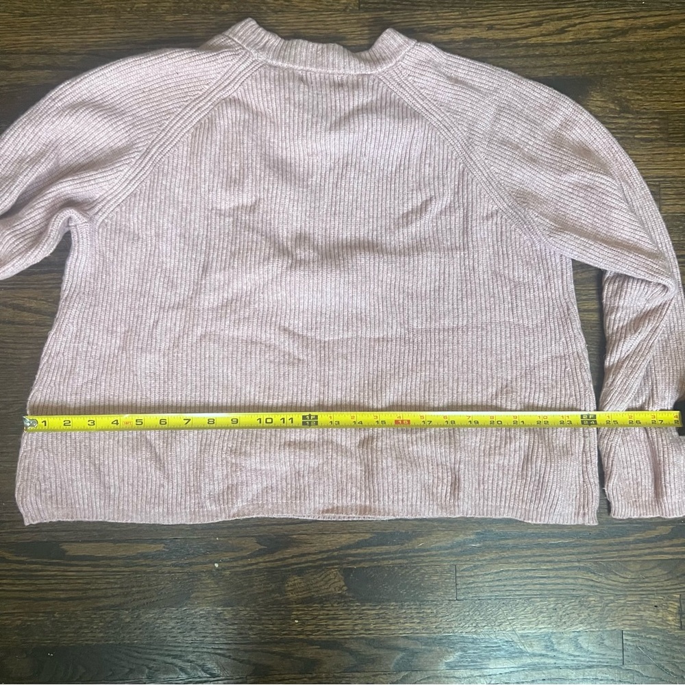 Pink cable-knit sweater